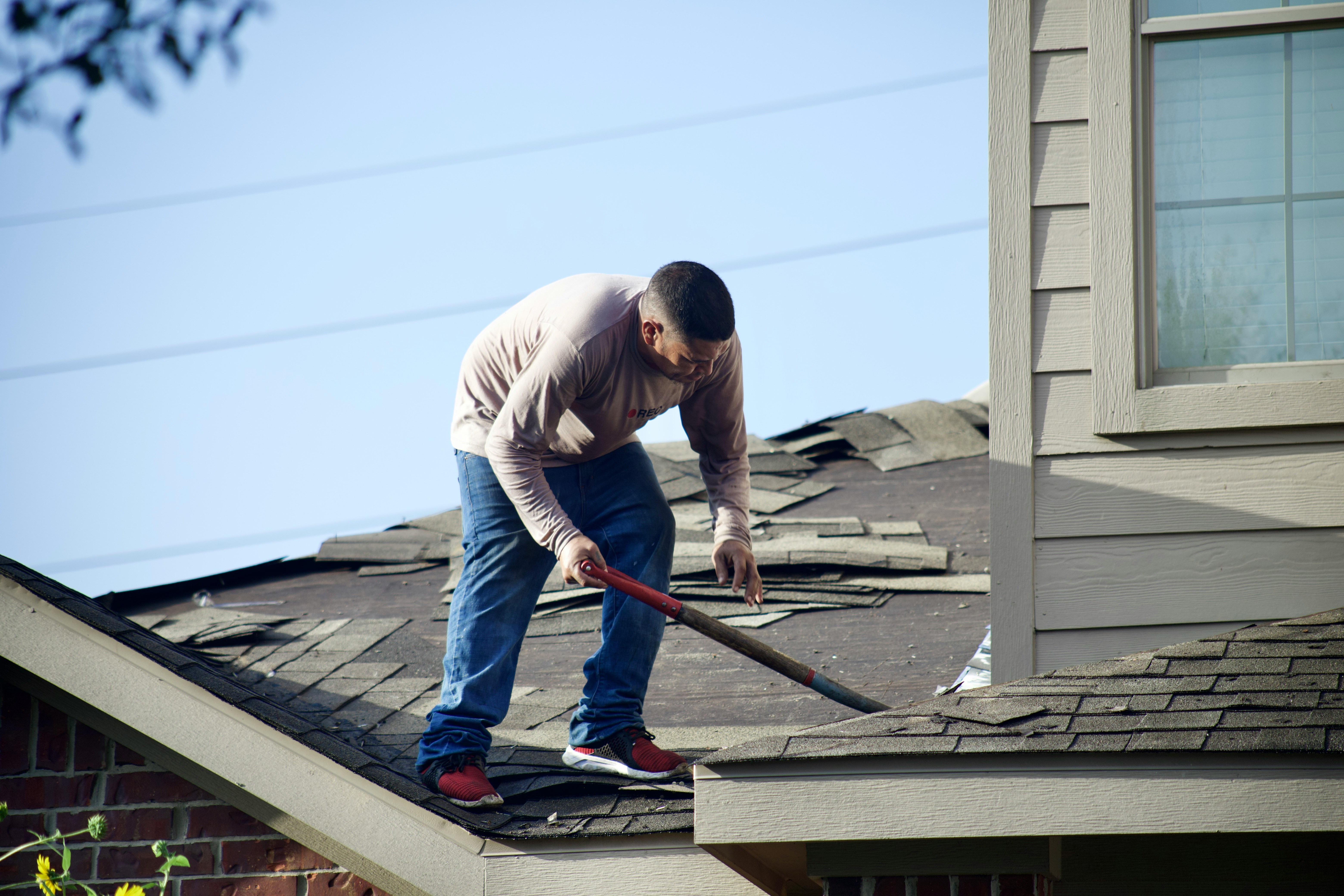 Roofing crew on a job site, representing roofing and construction contractor health insurance
